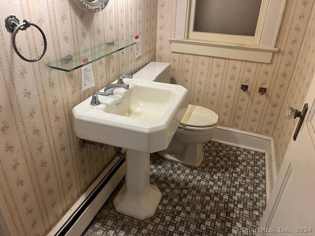 39 Rockefeller Ave, West Haven, CT 06516 - bathroom featuring toilet, wallpapered walls, and baseboards