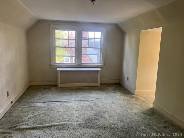 39 Rockefeller Ave, West Haven, CT 06516 - bonus room with radiator, lofted ceiling, carpet flooring, and baseboards