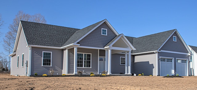 craftsman-style house featuring a garage and a porch