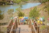 view of jungle gym with a water view