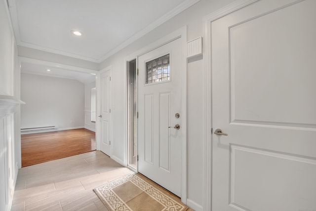 entryway with light wood-type flooring, crown molding, and a baseboard radiator