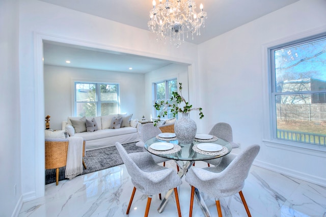 dining room with a chandelier