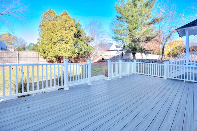 deck featuring a lawn