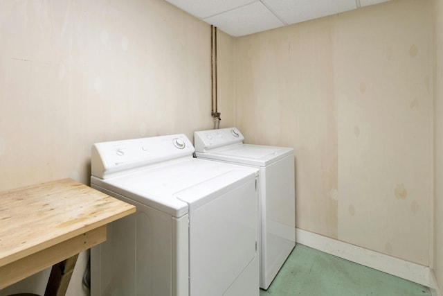 clothes washing area with independent washer and dryer