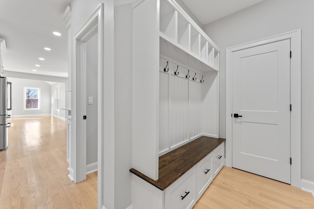 mudroom with light wood-type flooring