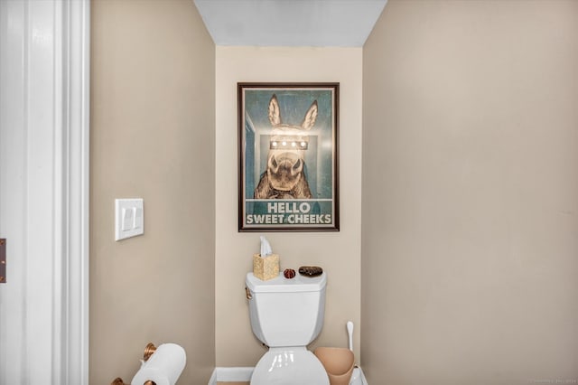 bathroom featuring toilet