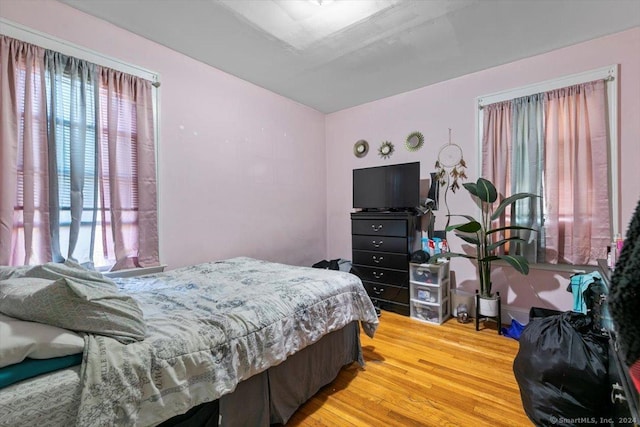 bedroom featuring hardwood / wood-style flooring