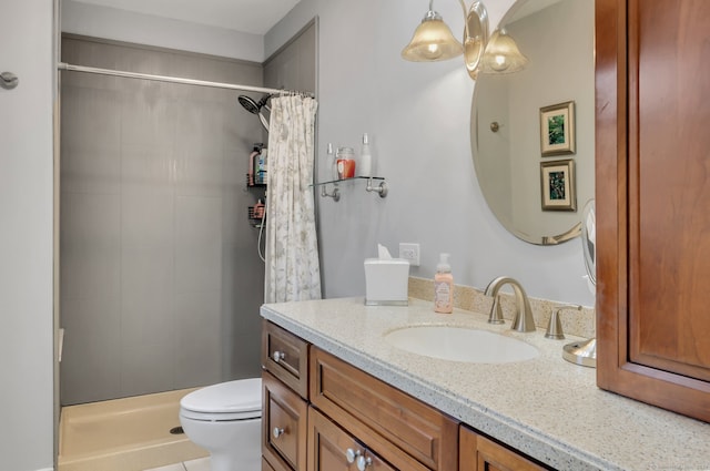 bathroom featuring a shower with curtain, vanity, and toilet