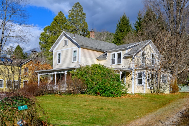 exterior space featuring a front yard