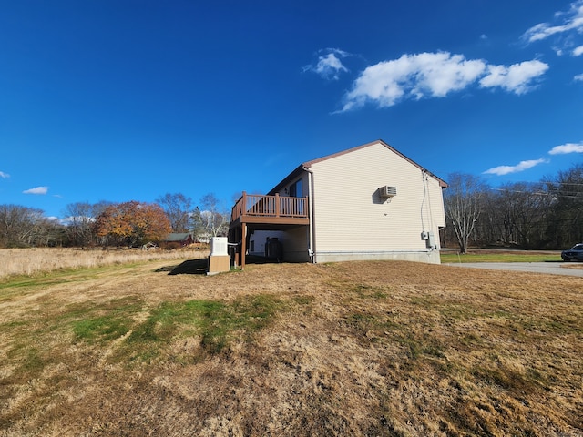 view of property exterior featuring a deck