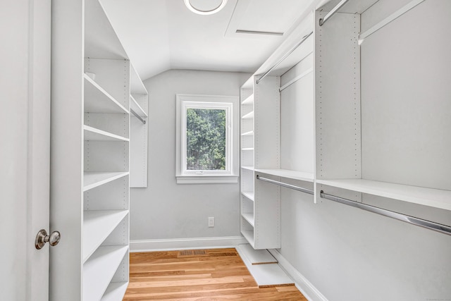 7 Topping Ln, Norwalk, CT 06854 - walk in closet with light wood finished floors and lofted ceiling