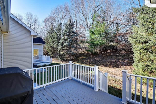 wooden terrace with grilling area