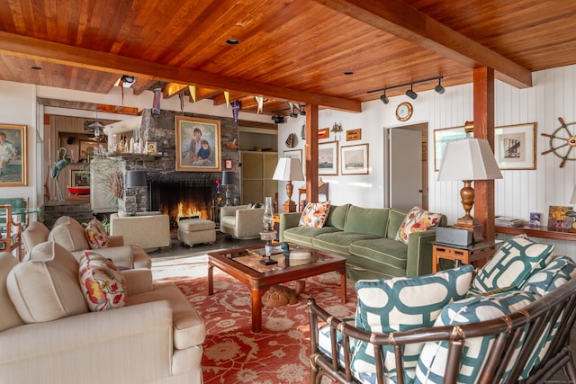 living room with beamed ceiling and wood ceiling