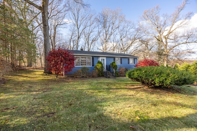 view of front of house with a front lawn