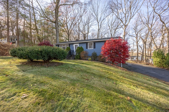 view of front of house featuring a front yard