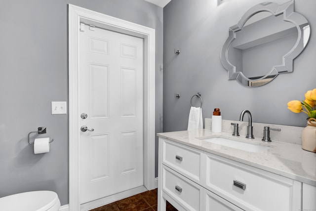 bathroom with tile patterned floors and vanity