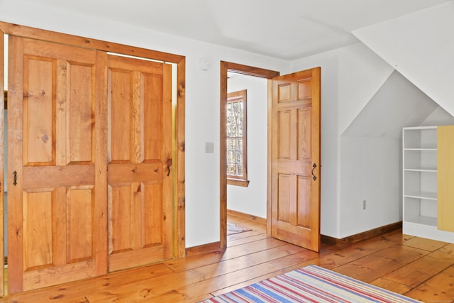 bonus room featuring light hardwood / wood-style floors