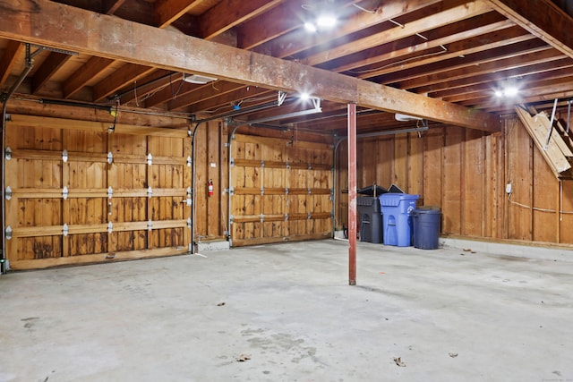 garage with wood walls