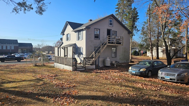 view of home's exterior with a yard