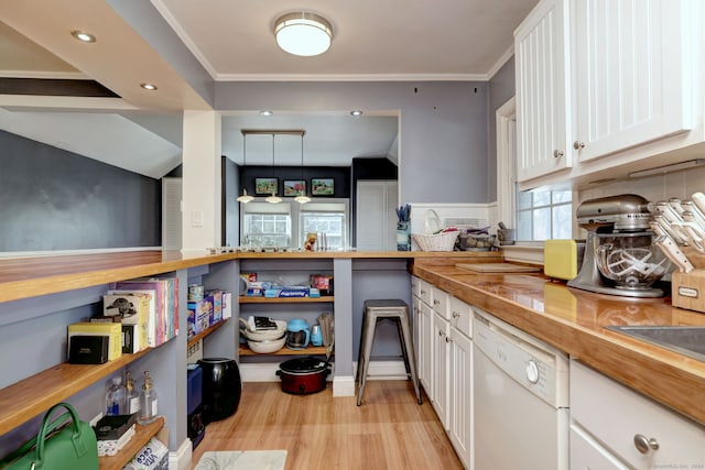 kitchen with light hardwood / wood-style flooring, white cabinets, wood counters, pendant lighting, and dishwasher