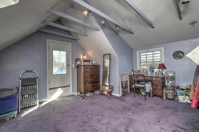 carpeted office with lofted ceiling with beams