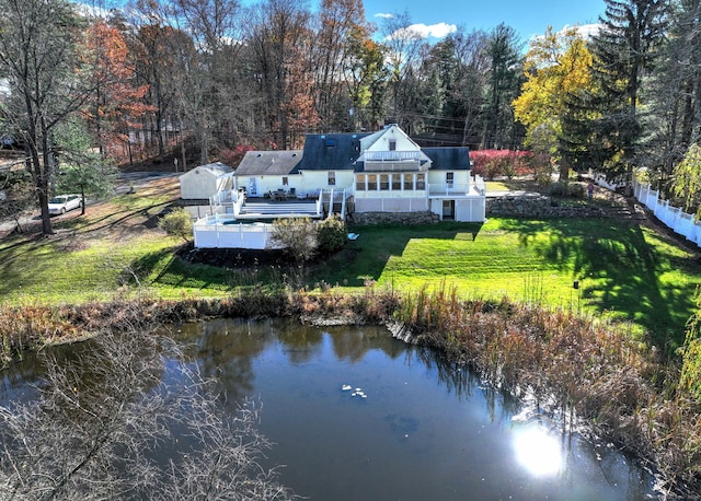 drone / aerial view featuring a water view