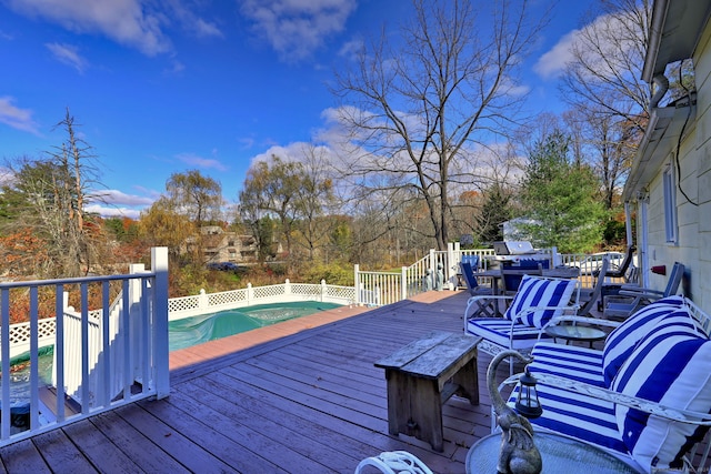 deck with a covered pool