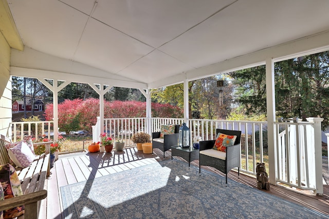 sunroom with vaulted ceiling