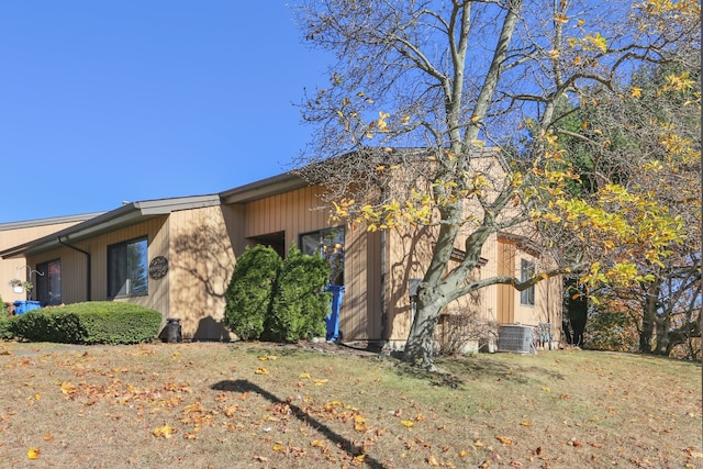 view of property exterior featuring central air condition unit