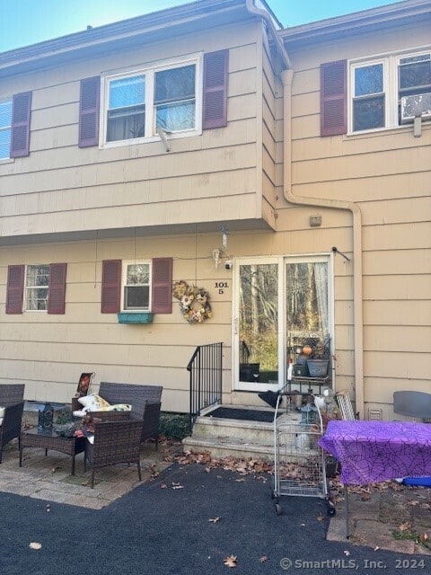 back of house featuring a patio