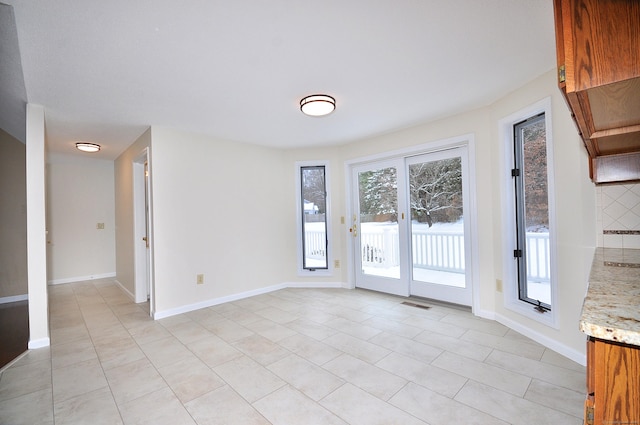 view of tiled spare room