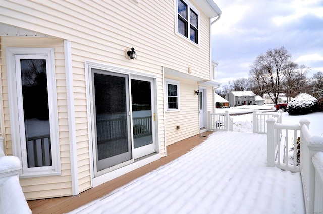 view of snow covered deck