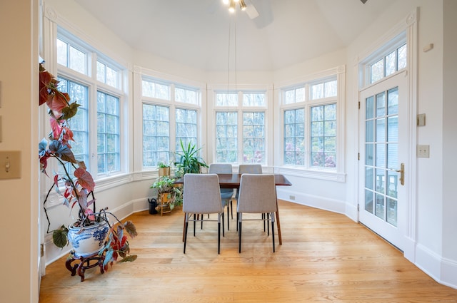 sunroom with a wealth of natural light and ceiling fan