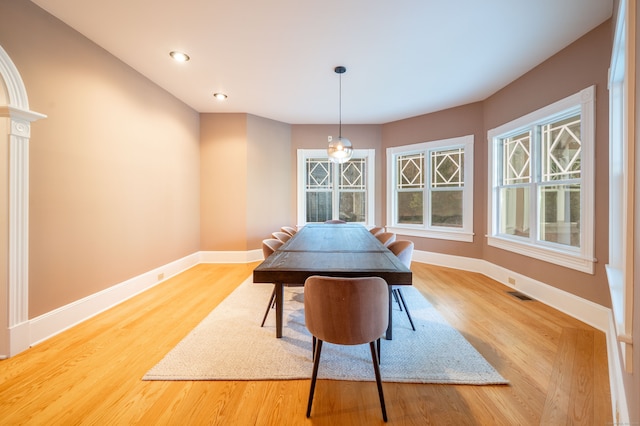 dining space with light wood-type flooring