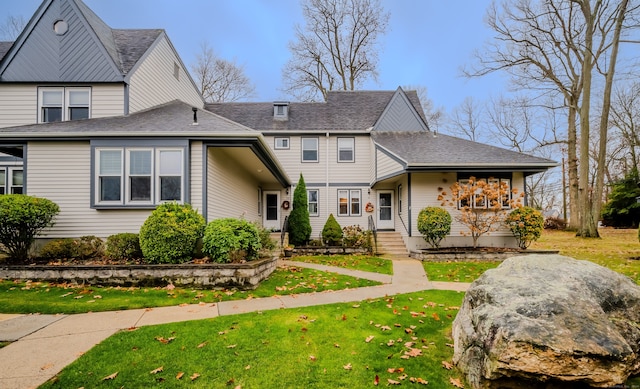 view of front of property with a front lawn