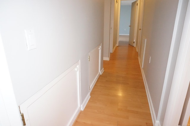 hall featuring light hardwood / wood-style flooring