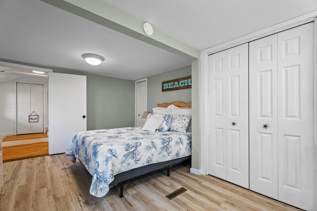 bedroom featuring light wood-type flooring