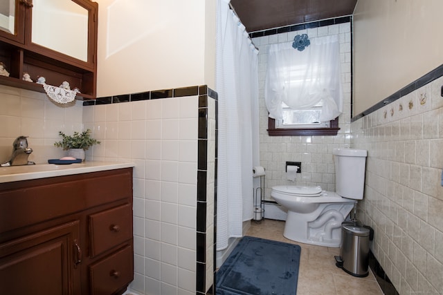 bathroom featuring tile walls, tile patterned flooring, vanity, and toilet