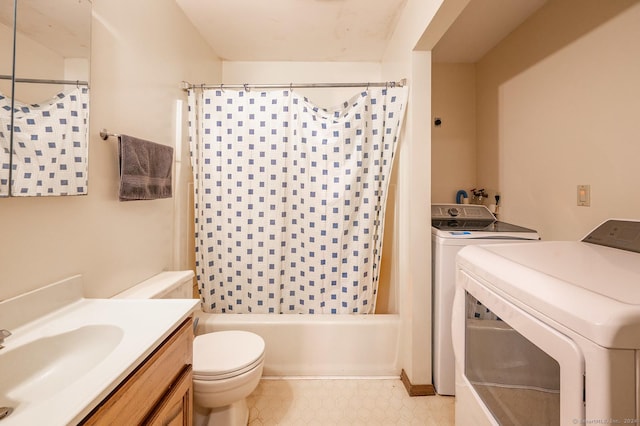 full bathroom featuring vanity, toilet, washing machine and dryer, and shower / tub combo with curtain