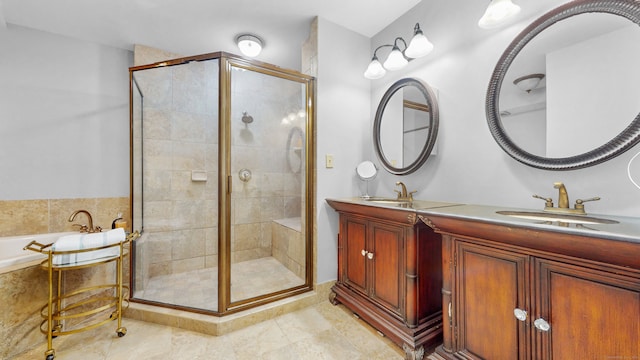 bathroom featuring vanity, tile patterned floors, and a shower with shower door