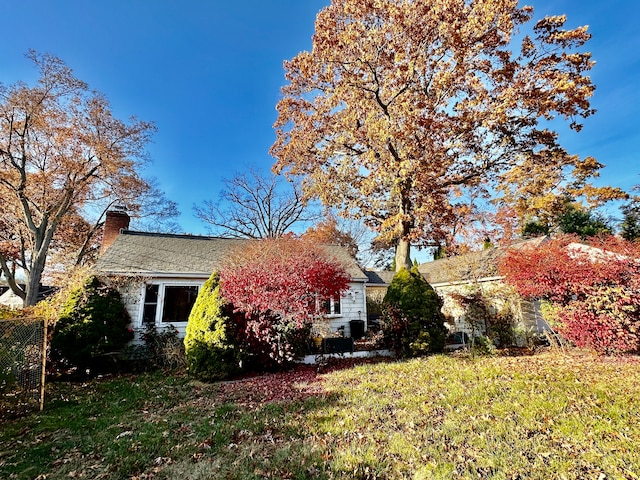 view of property exterior featuring a yard