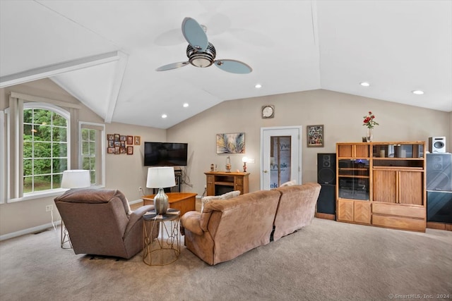 living room featuring vaulted ceiling, ceiling fan, and carpet floors