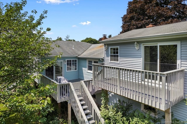 exterior space featuring a wooden deck