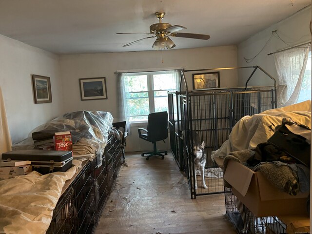 bedroom with wood-type flooring