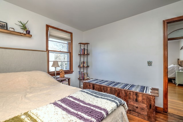 bedroom featuring hardwood / wood-style flooring