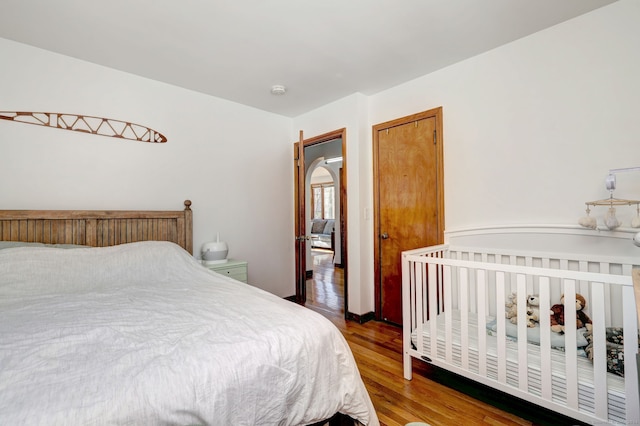 bedroom featuring wood-type flooring