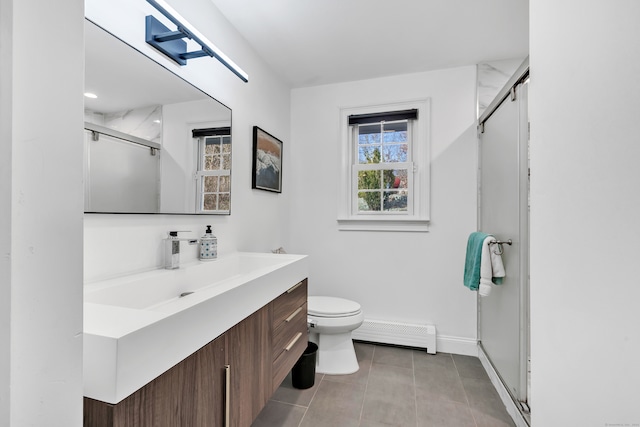 bathroom with vanity, tile patterned floors, toilet, walk in shower, and a baseboard radiator