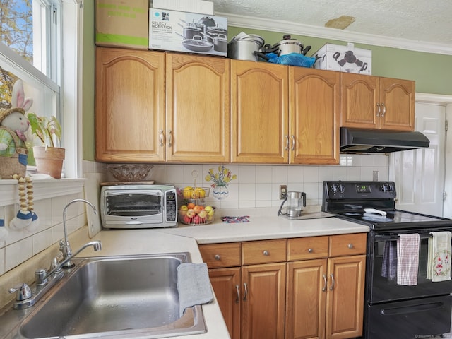 kitchen with a textured ceiling, sink, black range with electric stovetop, crown molding, and backsplash