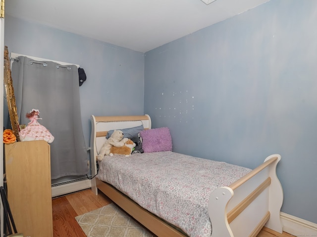 bedroom featuring light wood-type flooring