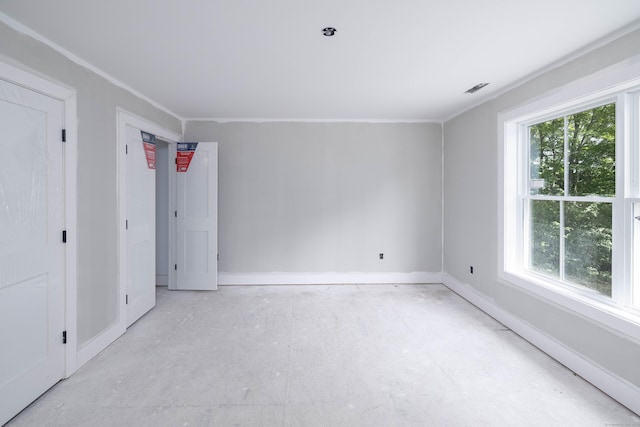 250 Atkins St, Middletown, CT 06457 - unfurnished bedroom featuring multiple windows and baseboards